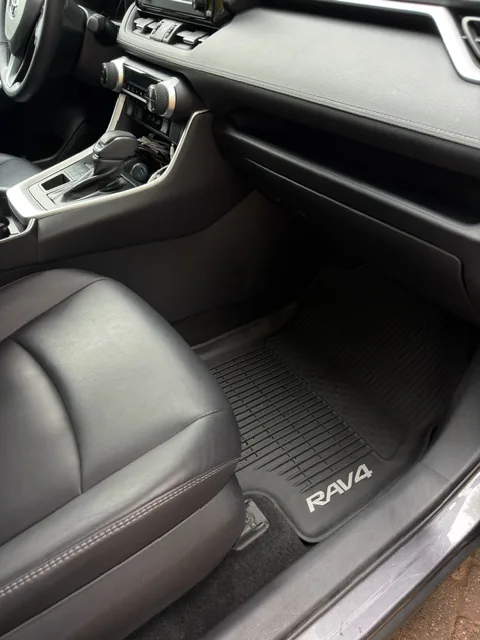 Toyota RAV4 interior after detailing — clean seats and floor mats