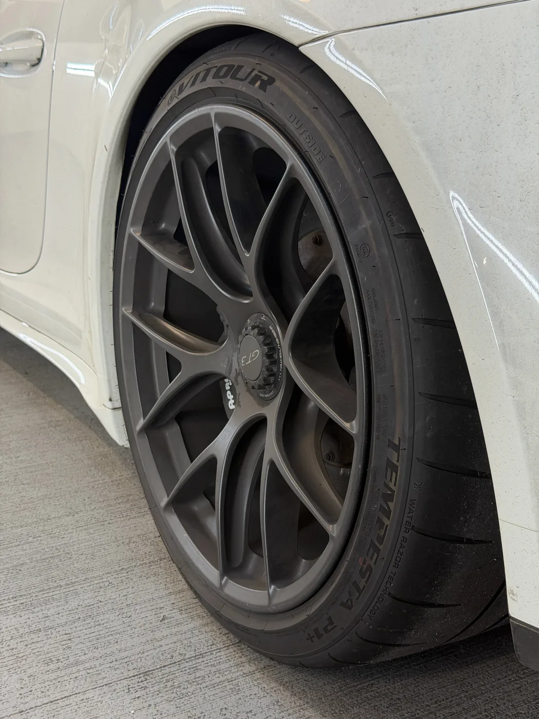 Porsche GT3 wheel before detailing — water spots and residue