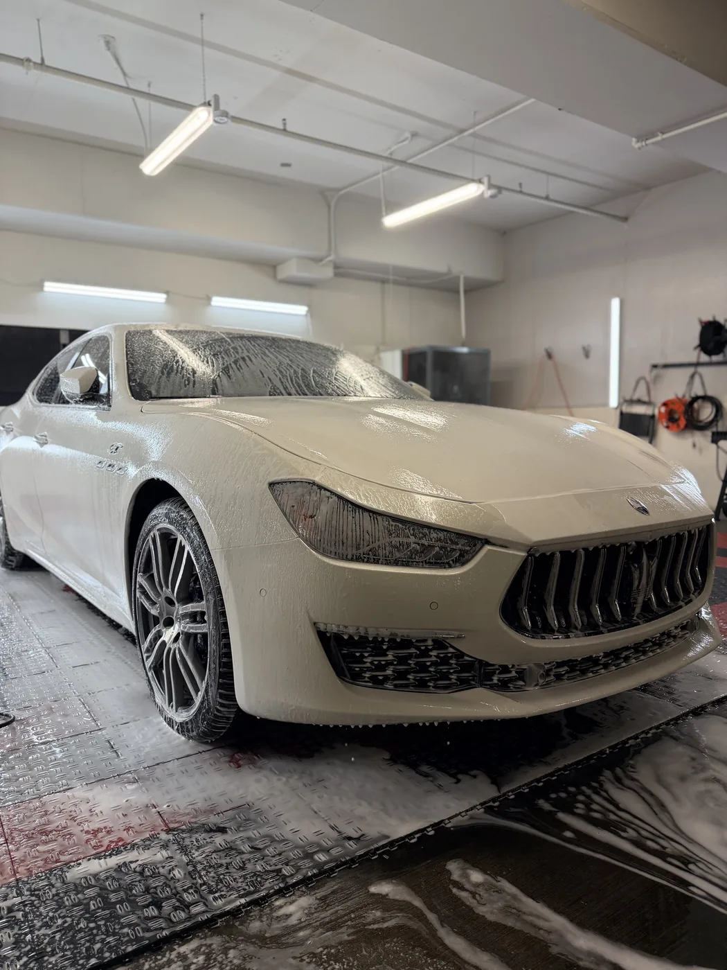 Maserati Ghibli covered in foam during wash