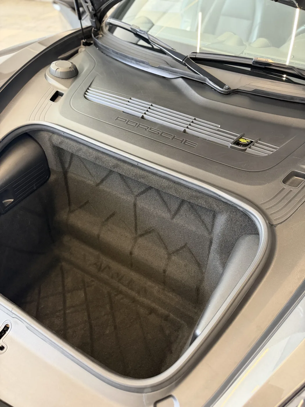 Detailed Porsche front trunk interior